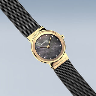 Bering Ladies Black & Gold Mother of Pearl Dial Watch