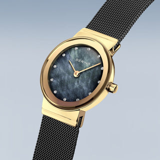 Bering Ladies Black & Gold Mother of Pearl Dial Watch
