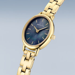 Bering Ladies Gold Tone Black Mother of Pearl Oval Dial Watch