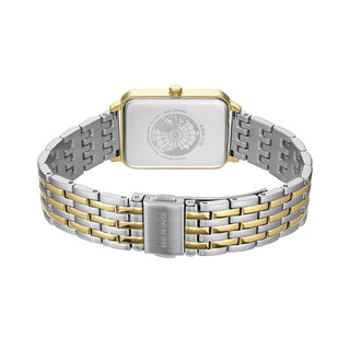 Two-tone watch with silver and gold band on a white background