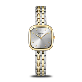 A Bering ladies cushion watch with a brushed gold case and a white dial, accompanied by a gold stainless steel strap. The watch has a square case shape and flat sapphire crystal glass.