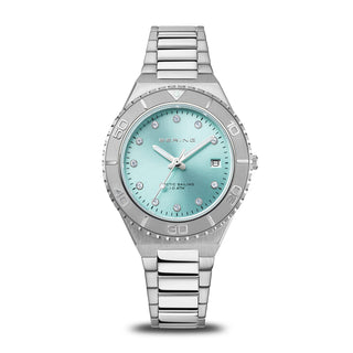 Silver watch with a light blue face on a white background