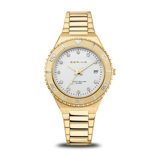 Gold wristwatch with a white dial on a white background