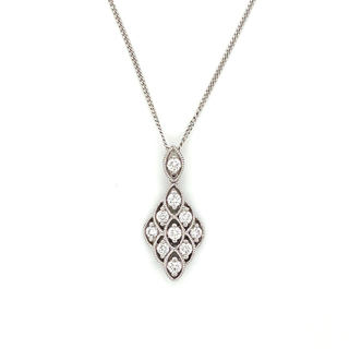 Diamond pendant necklace on a white background