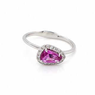 18ct white gold ring with a pink gemstone on a white background