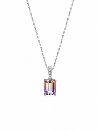 Necklace with a pendant featuring a purple gemstone on a white background