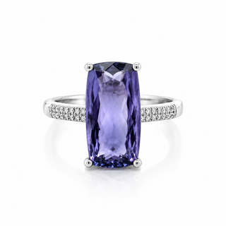 Ring with a purple gemstone and diamond-studded band on a white background