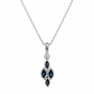 A white gold pendant necklace featuring four marquise-cut deep blue gemstones in an interlocking arrangement, accented by a small round clear stone above, shown on a white background.