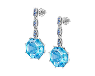 18ct white gold blue topaz and sapphire drop earrings on a white background