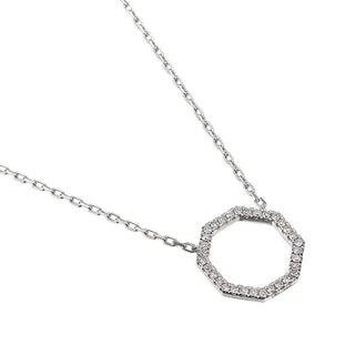 white gold necklace with a hexagonal pendant on a white background