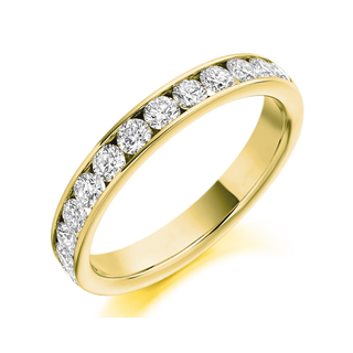 Gold ring with diamonds on a white background