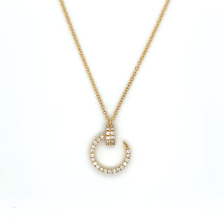 Gold necklace with a unique pendant on a white background