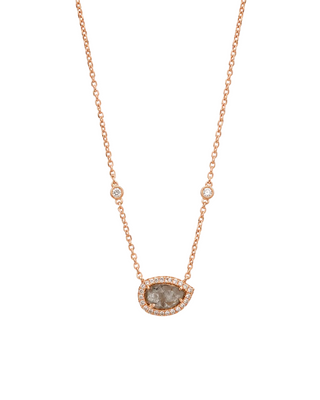 Rose gold necklace with a pendant on a white background
