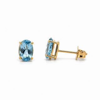 9ct Yellow Gold Oval Blue Topaz Stud Earrings