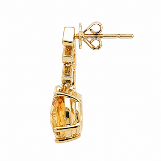 A single gold drop earring featuring a large, faceted amber-yellow gemstone in a prong setting, shown from the side on a plain white background.