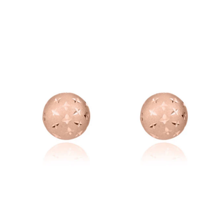 Rose gold ball earrings with cut-out design on a white background