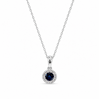 Silver necklace with a blue gemstone pendant on a white background