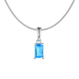 Silver pendant with a blue gemstone on a white background