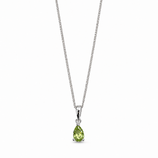 Green teardrop pendant on a silver chain against a white background