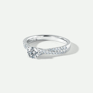 Silver ring with diamonds on a white background