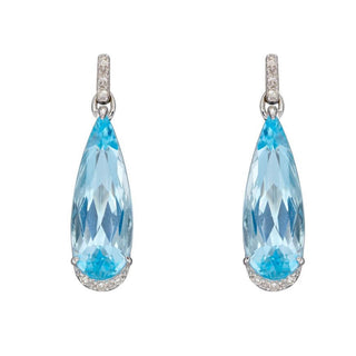 A pair of 9ct white gold blue topaz teardrop earrings with diamond embellishments.