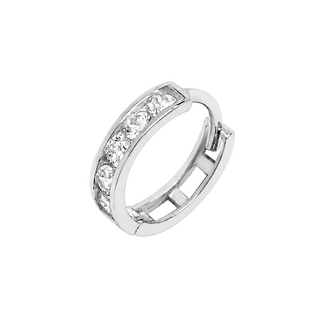 A silver-toned huggie hoop ring featuring a channel-set row of clear round gemstones on the front band, photographed on a clean light gray background.