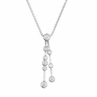 A white gold dangle necklace with a delicate box chain and a pendant featuring a series of clear round-cut gemstones on a plain white background.