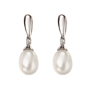 Pair of pearl earrings with silver hooks on a white background