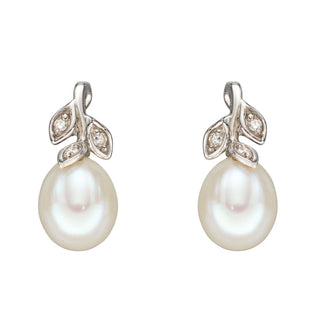 Pearl earrings with diamond accents on a white background