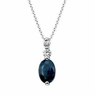 Necklace with a blue gemstone pendant on a white background