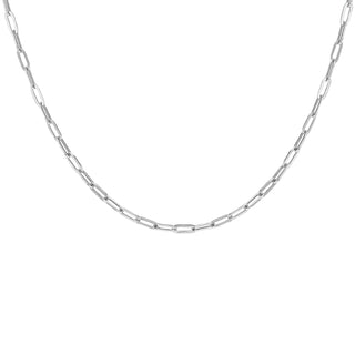 A silver paperclip chain necklace displayed in a curved shape against a clean gray gradient background.