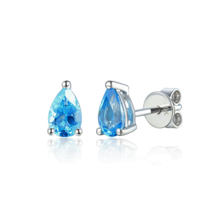 Pair of silver teardrop earrings with blue gemstones on a white background