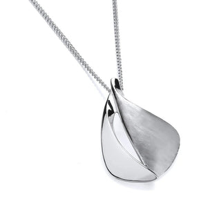 A silver pendant necklace featuring a curved, leaf-like metallic design on a delicate chain, set against a plain white background.