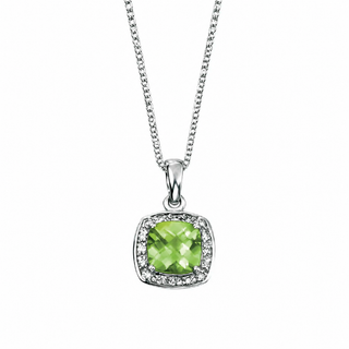 Necklace with a leaf-shaped pendant featuring a pink gemstone on a white background
