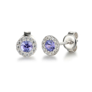 Pair of silver earrings with purple gemstones on a white background