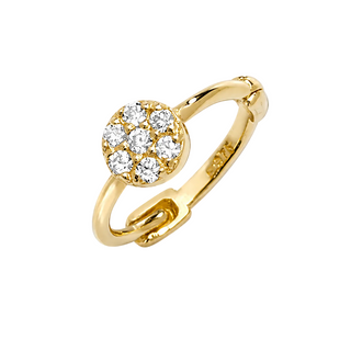 A yellow gold huggie ring featuring a round cluster of clear pavé gemstones on a clean white background.
