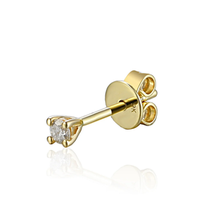 Gold stud earring with a diamond on a white background