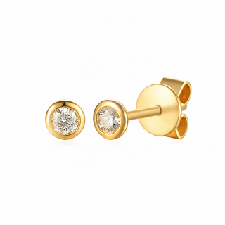 Gold stud earrings with clear gemstones on a white background