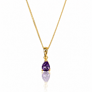 Gold necklace with a purple gemstone pendant on a white background