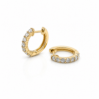 Gold hoop earrings with diamond accents on a white background