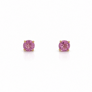 Pair of pink gemstone earrings on a white background