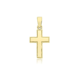 A yellow gold cross pendant with a polished center and a textured, beaded border, shown on a clean white background with a subtle reflection below.