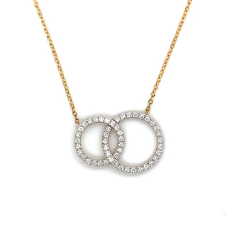 Necklace with interlocking circular pendants on a white background