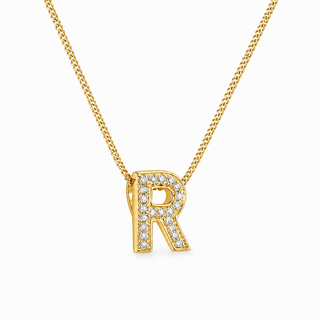 Gold necklace with a 'R' pendant on a white background