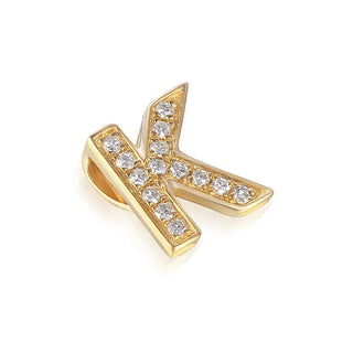 Gold and diamond-studded letter 'K' pendant on a white background