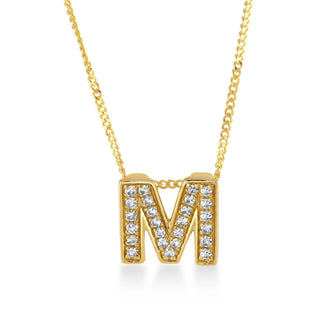 Gold necklace with a 'M' pendant on a white background