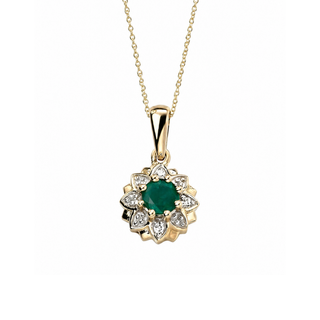 Gold pendant with a green gemstone and diamonds on a white background