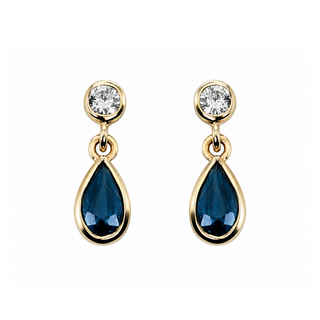 Gold earrings with blue teardrop stones and clear gemstones on a white background