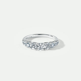 white gold ring with graduated diamonds on a white background