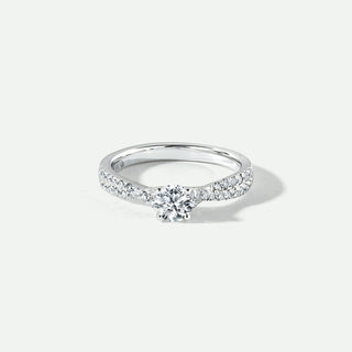 Diamond ring on a light gray background